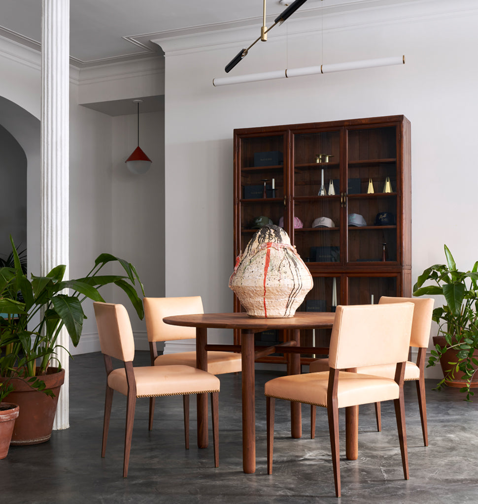 The Lion Chair (Black Walnut/Vachetta Leather) — Roll & Hill Showroom, New York City. Image by Louisa Fulkerson + Fyodor Shiryaev