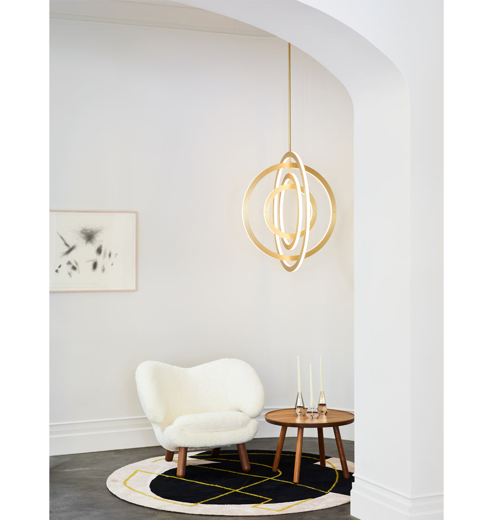 Chandelier - Vertical, 4 Rings (Brushed brass) — Roll & Hill Showroom, New York City. Image by Nicole Franzen