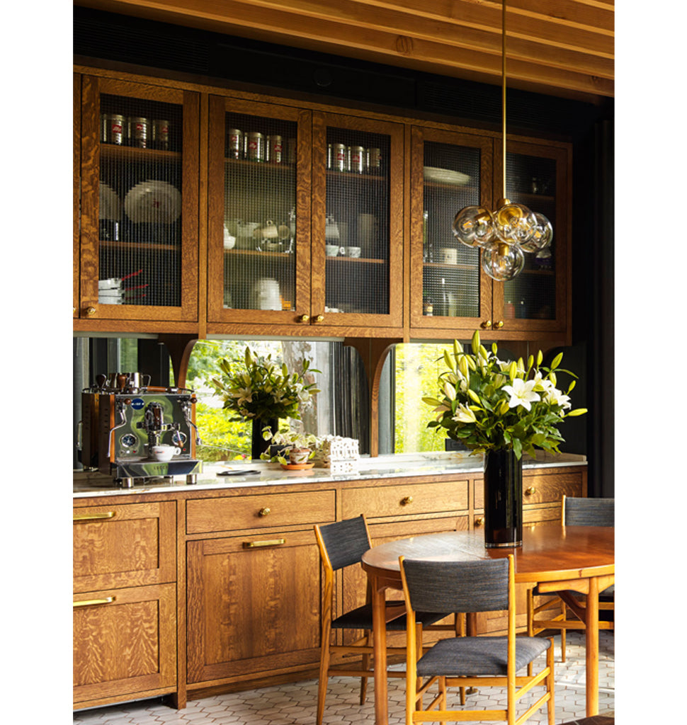 Pendant - 5 Globes (Brushed brass/Clear) — Brooklyn, New York. Interior by Olivia Song + Leroy Street Studio Architecture. Image by Annie Schlechter