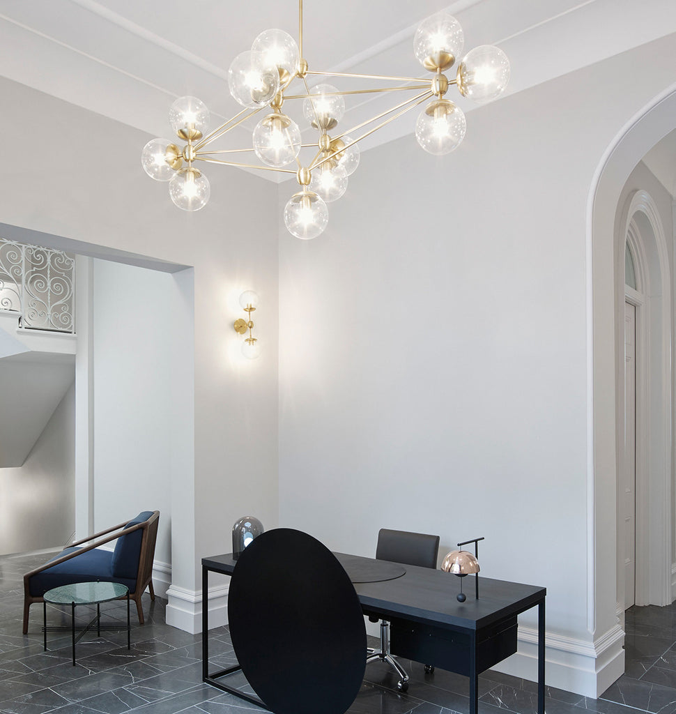 Chandelier - Diamond, 13 Globes (Brushed brass/Clear) — Sloane Street, London. Courtesy of Wallpaper*
