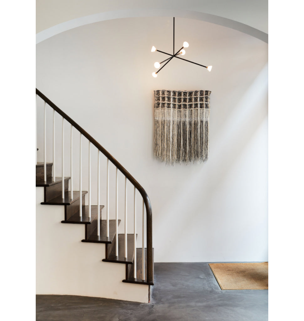 Chandelier - 6 Lights (Matte black/Brushed brass) — Roll & Hill Showroom, New York City. Image by Nicole Franzen